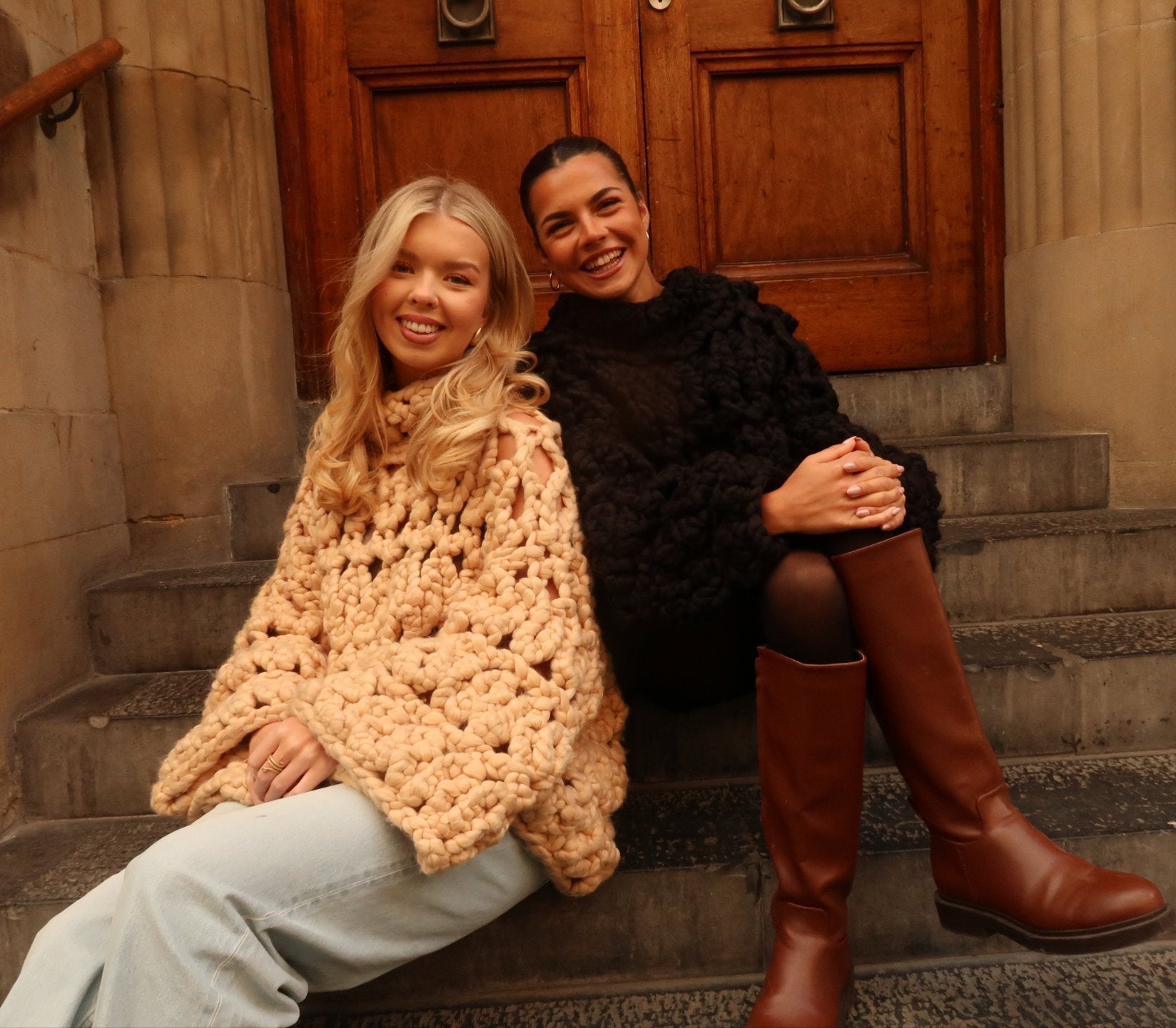 Shone statement knitwear. Oversized, chunky colossal knit sweater, turtle neck design knitted with vegan and sustainable yarn. In black and cream.