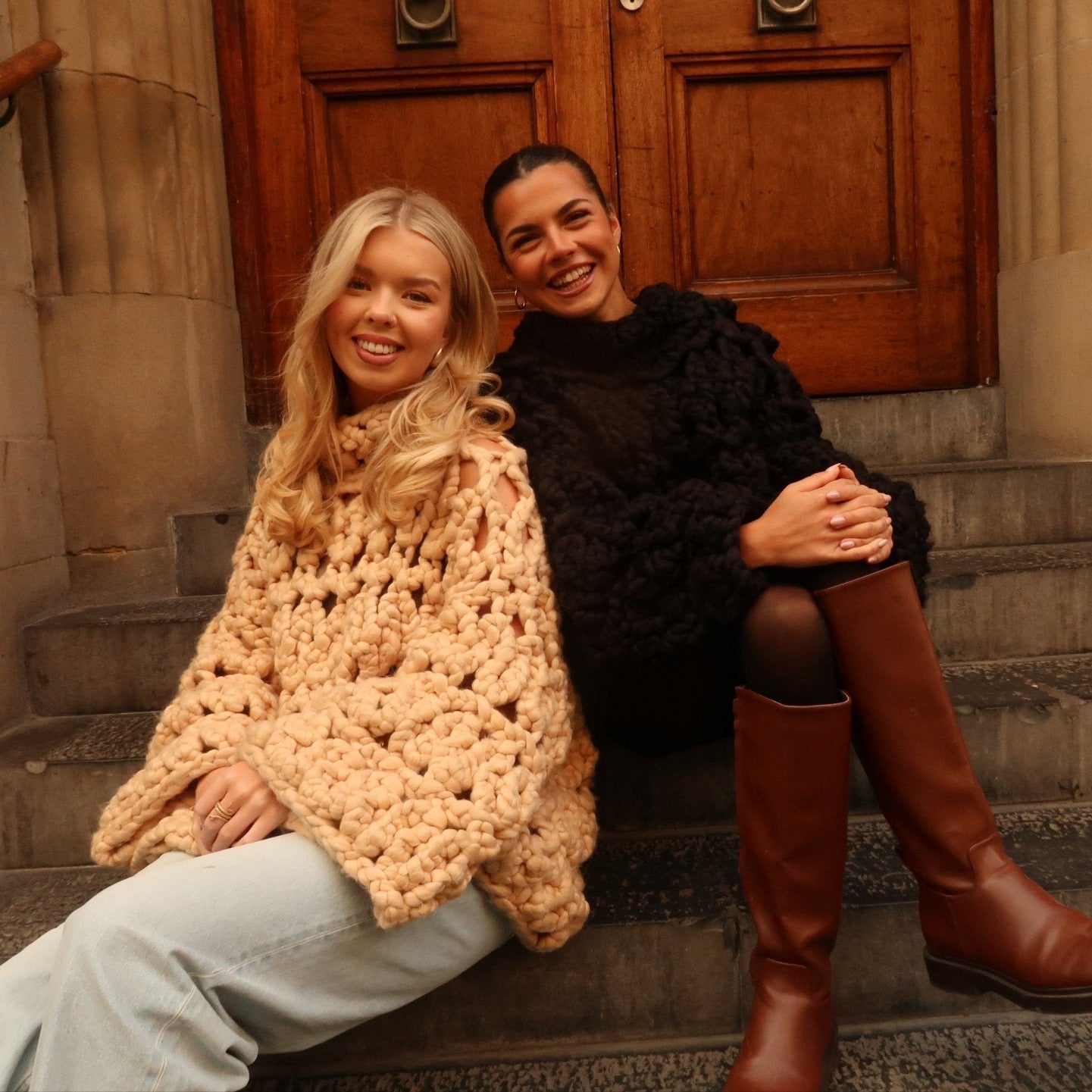 Shone statement knitwear. Oversized, chunky colossal knit sweater, turtle neck design knitted with vegan and sustainable yarn. In black and cream.