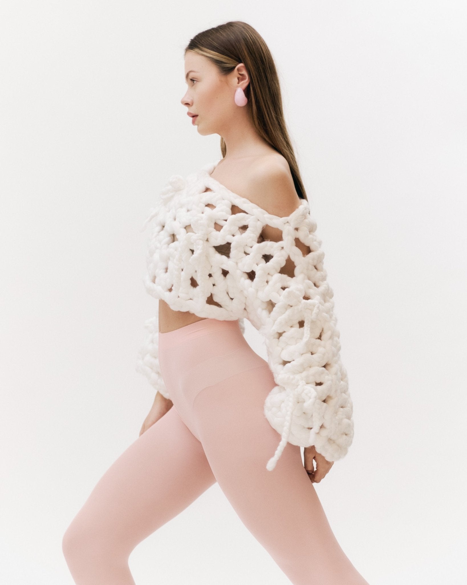 Shone knitwear, super soft chunky knit cropped sweater in white. Oversized, off the shoulder, design. Sustainable and vegan yarn.