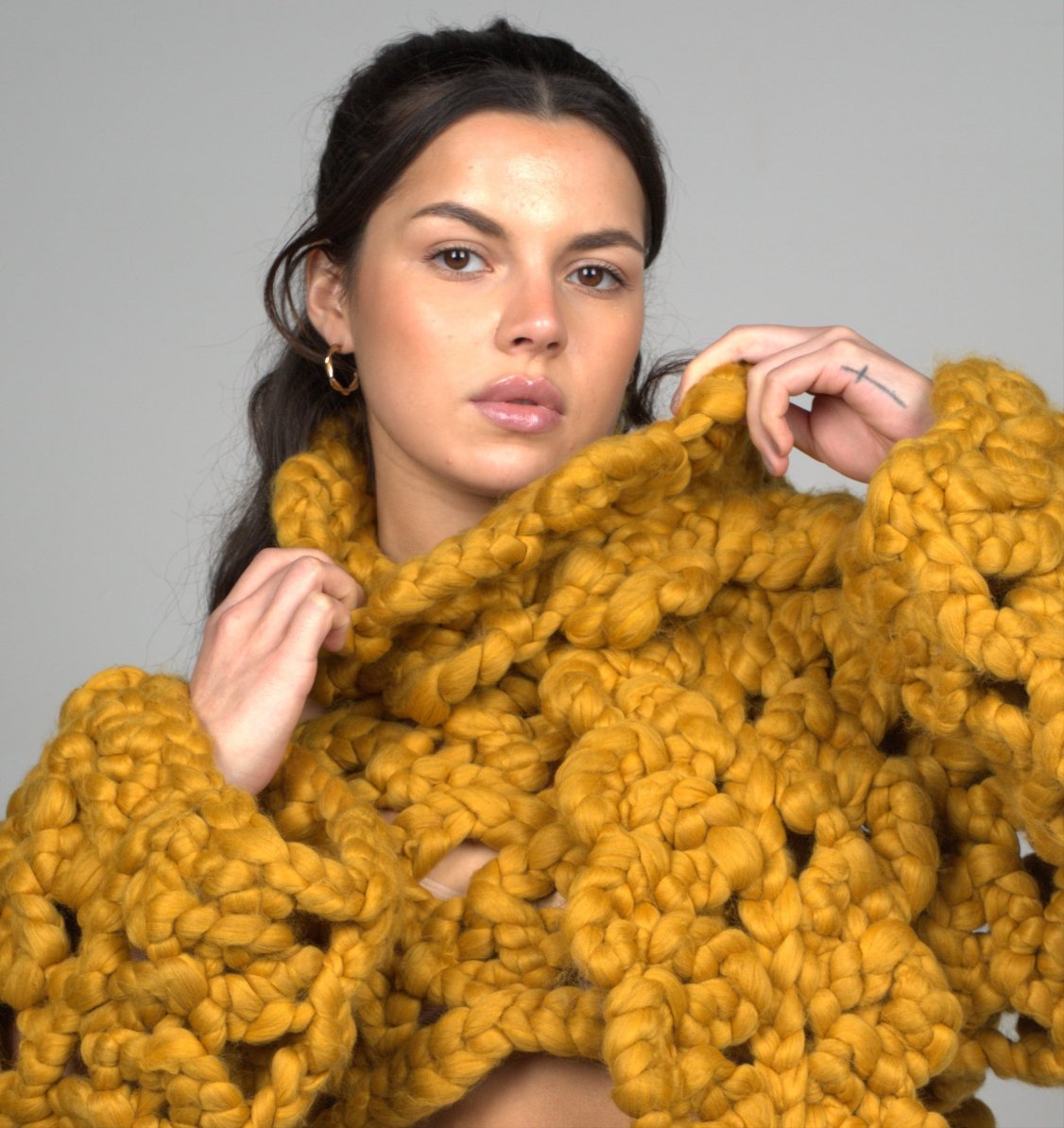 Shone Knitwear. Super soft, chunky knit, oversized scarf in yellow. Statement accessory made with vegan and sustainable yarn.