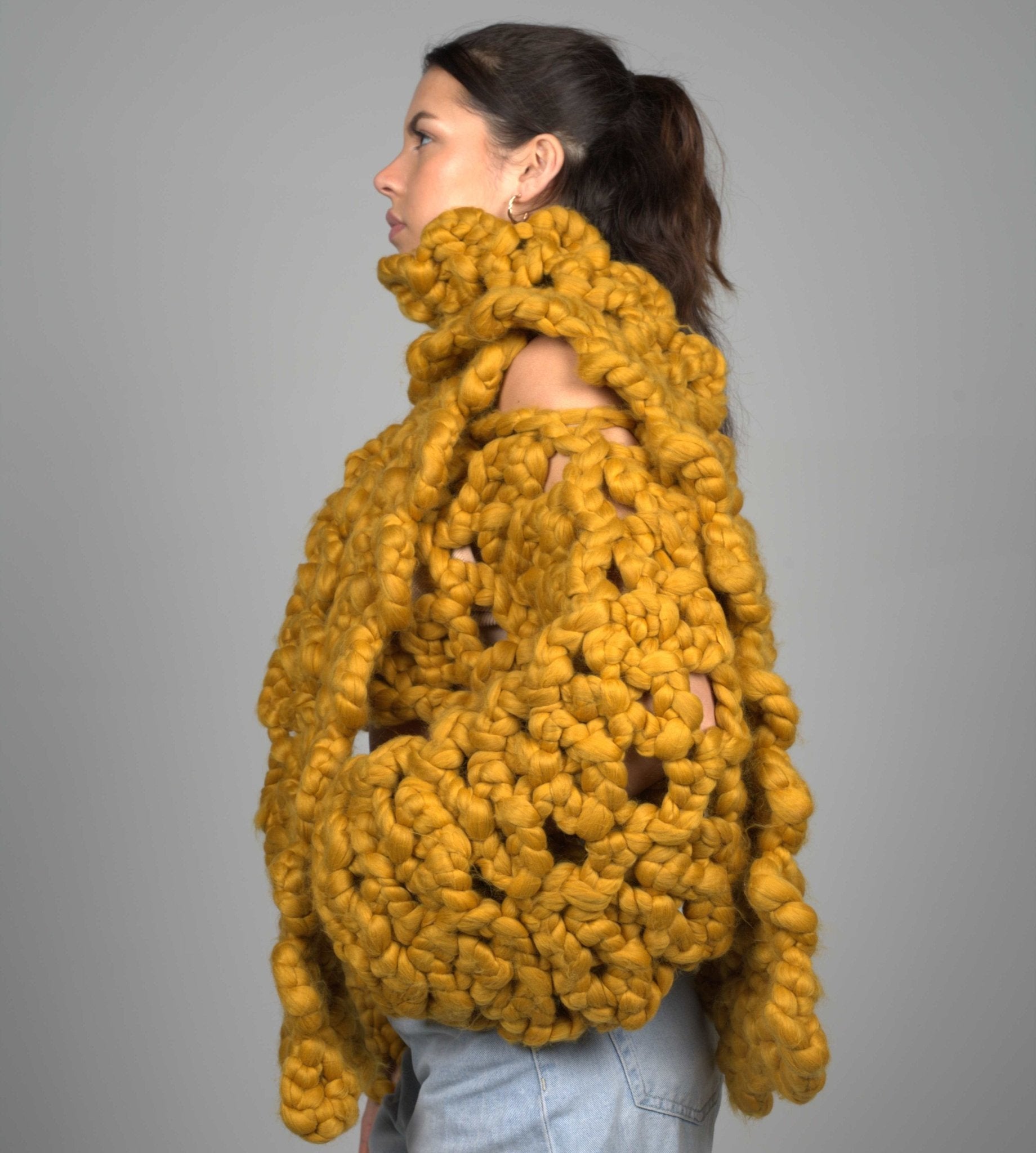 Shone Knitwear. Super soft, chunky knit, oversized scarf in yellow. Statement accessory made with vegan and sustainable yarn.