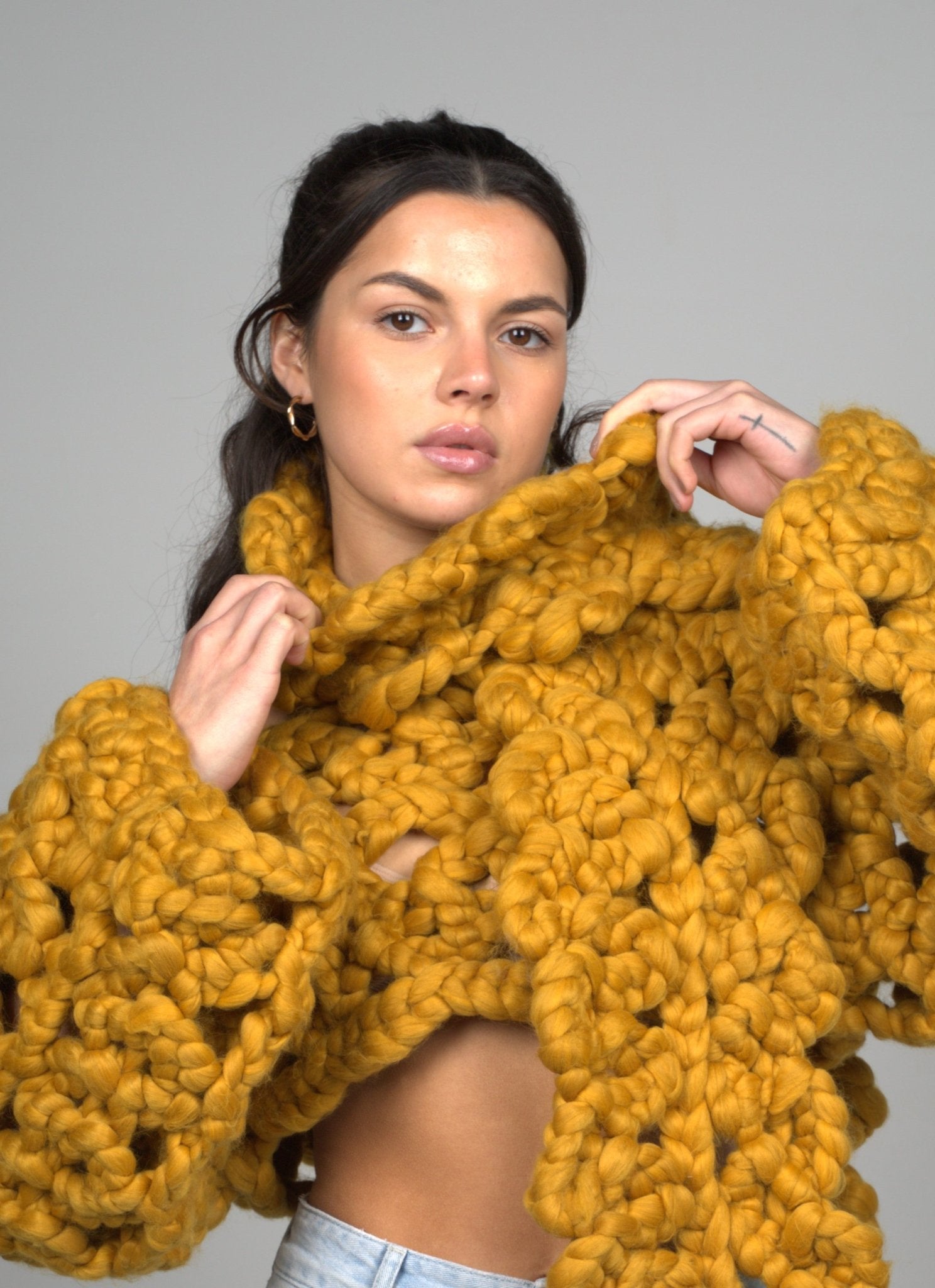 Shone Knitwear. Super soft, chunky knit, oversized scarf in yellow. Statement accessory made with vegan and sustainable yarn.